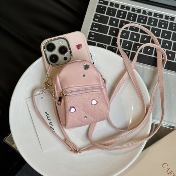 För iPhone 14 Pro TPU Skal Läder Liten Skolväska Design Mobilskal med Axelrem - Rosa