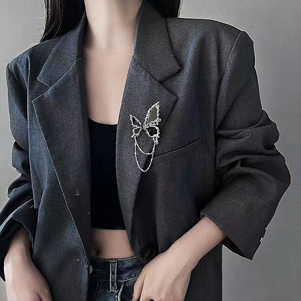 Sort sommerfugl-tassel metal broche til kvinder - sød og cool