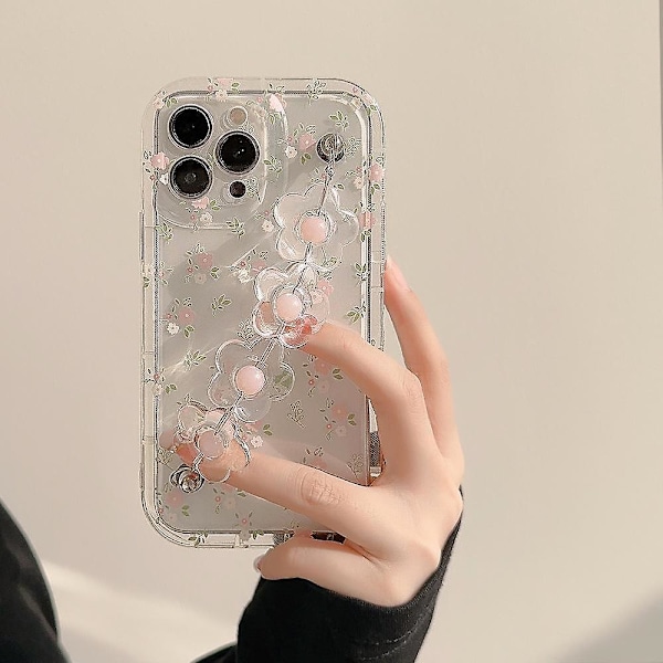 Läpinäkyvä kukka-aiheinen TPU-puhelinkotelo iPhone 13 Pro Max -puhelimelle, jossa kukkakoruketju