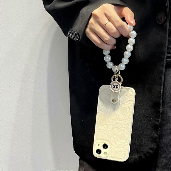 Til iPhone 14 Plus Telefonskal TPU+PU Læder Cover Kamelia Mønster Telefonetui med Perlekæde