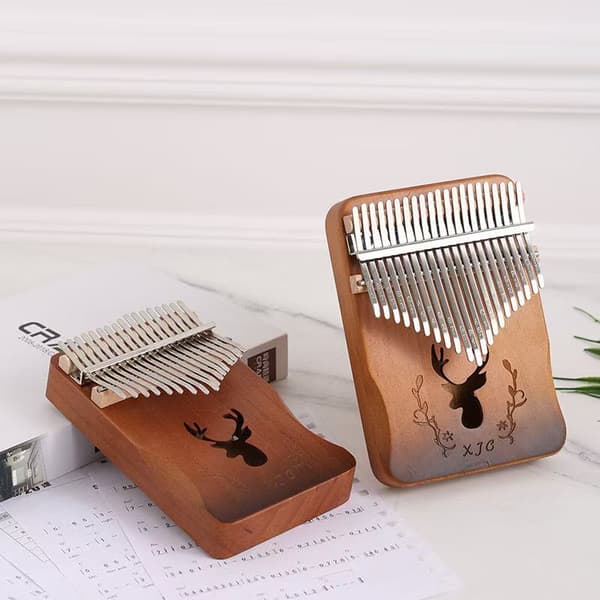 21-tons trä ihålig kalimba fingerpiano, en populär födelsedagspresent. Gradient butterfly