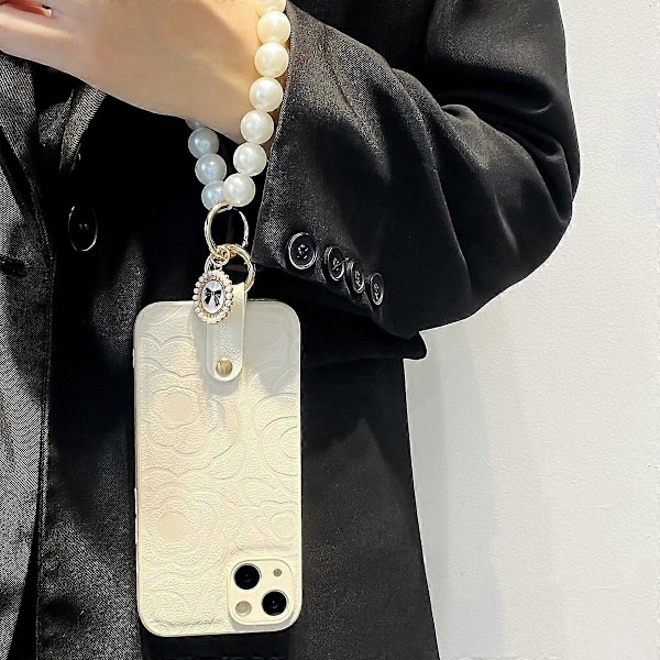 Til iPhone 14 Plus Telefonskal TPU+PU Læder Cover Kamelia Mønster Telefonetui med Perlekæde