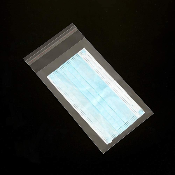 Set med 100 transparente cellofanplastposer med selvklebende lukking