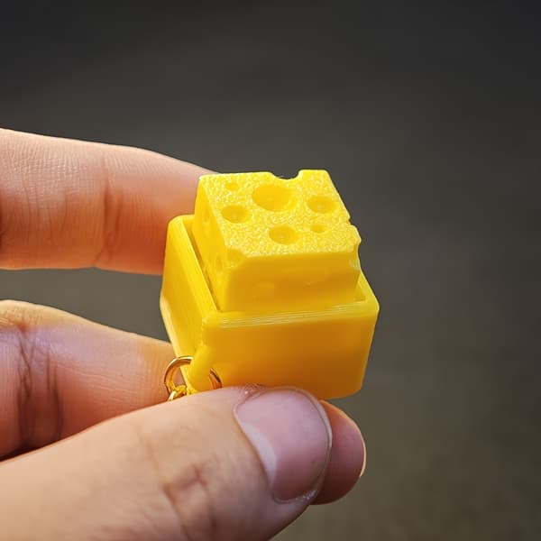 Osteformet mekanisk knapp nøkkelring - Lys gul 2pcs