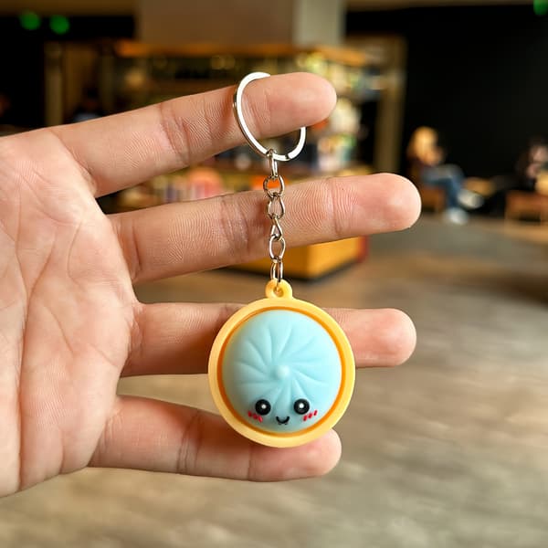 dumpling squishy keychain, squeeze keychain, dumpling fidget toys, fun keychain for anxiety and stress reduction blue