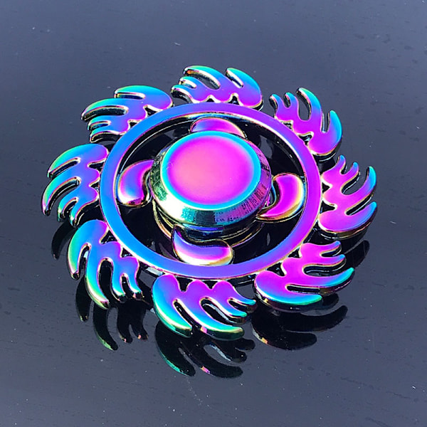 Metallisk farverig legering fingerspids gyro fingerrotation nyttigt værktøj til trykaflastning Colorful Blade 134