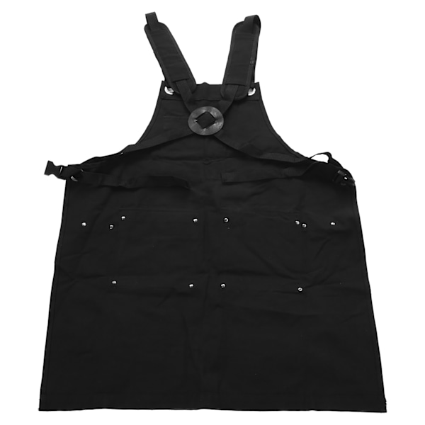 Canvas work apron for outdoor camping with adjustable strap and several pockets for tool storage.