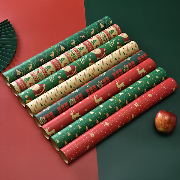 8-pack med 8 mönster julpapper Tomte