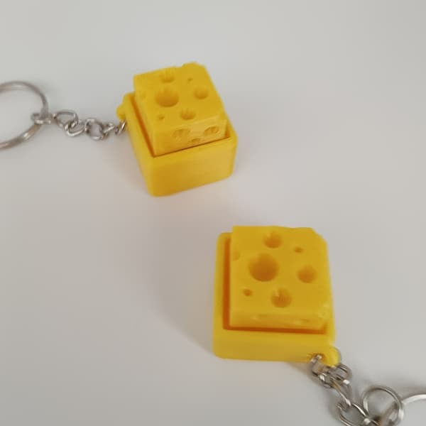 Osteformet mekanisk knapp nøkkelring - Lys gul 2pcs