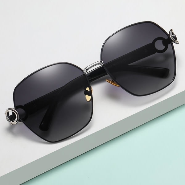 Polariserade solglasögon för kvinnor män Uv-skydd metallbåge Klassiska trendiga solglasögon
