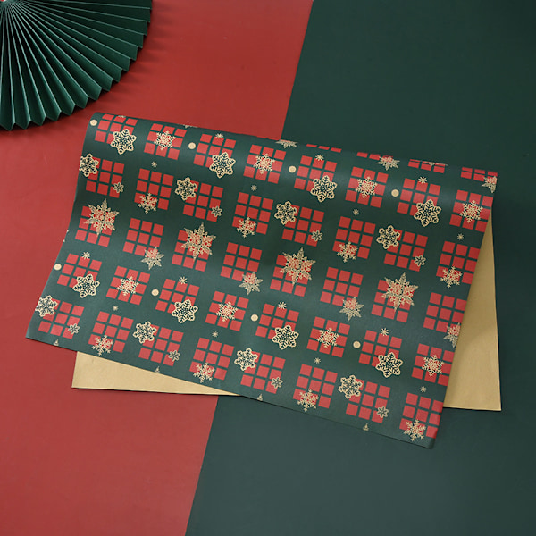 8-pack med 8 mönster julpapper Tomte