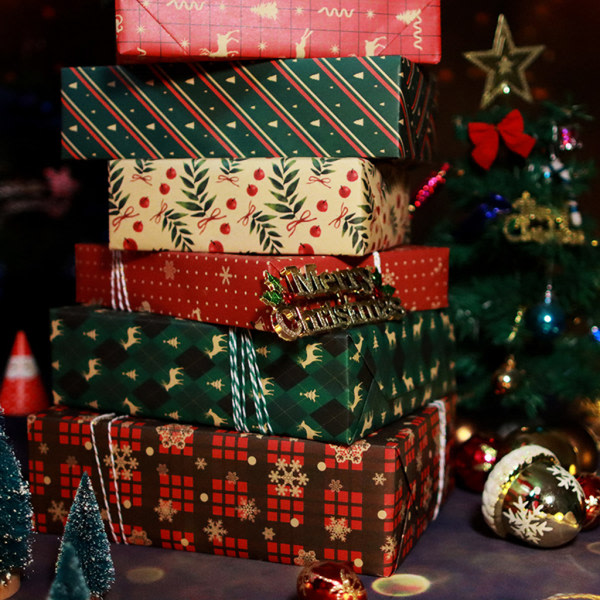 Julförpackningspapper Kraftpapper med presentförpackning för snöflingaälgmönster