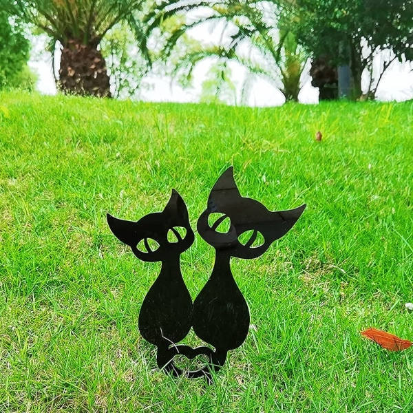 Puutarhakoriste, kissakoriste Puutarhasiluetti ulkoilmanurmi