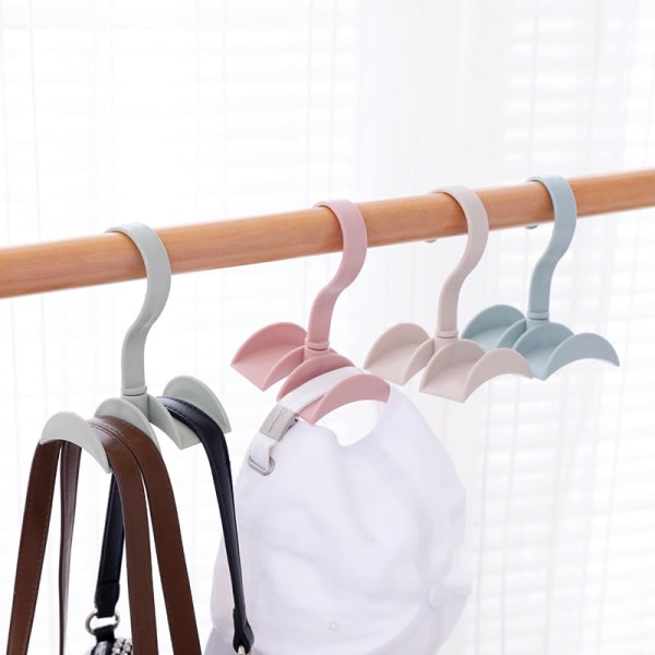 Roterande ställ for hängande handväska, halsduk, slips