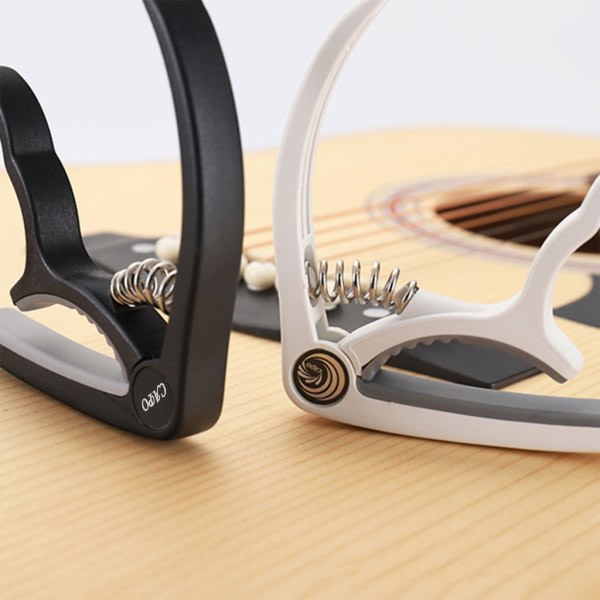 Plast Stålgitarr Capo Klassisk akustisk gitarr Ukulele Tuning Clamp Nybörjare Övning Musikverktyg Svart