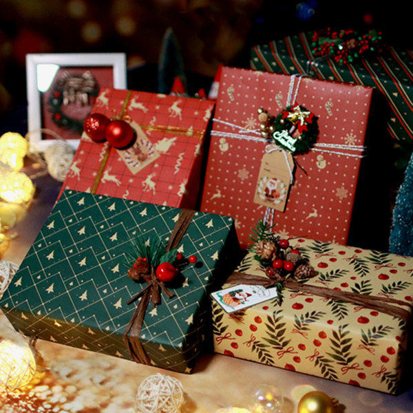 Julförpackningspapper Kraftpapper med presentförpackning för snöflingaälgmönster