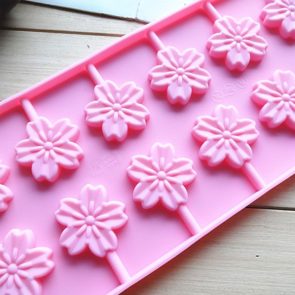 1 st Silikon Lollipopform 12 Håligheter Körsbärsblommformad Hård Karamell Choklad Gelé Tårta Bakform Rosa