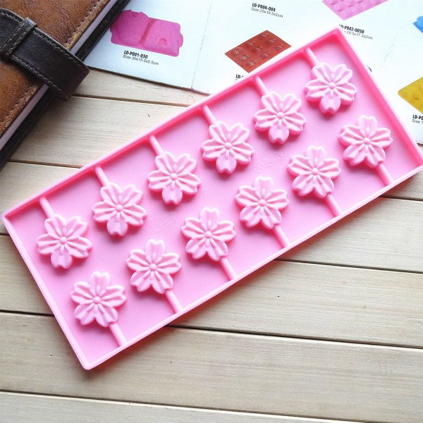 1 stk Silikon Lollipop Form 12 Hulrum Kirsebærblomst Formet Hård Karamel Chokolade Gele Kage Bageform Pink