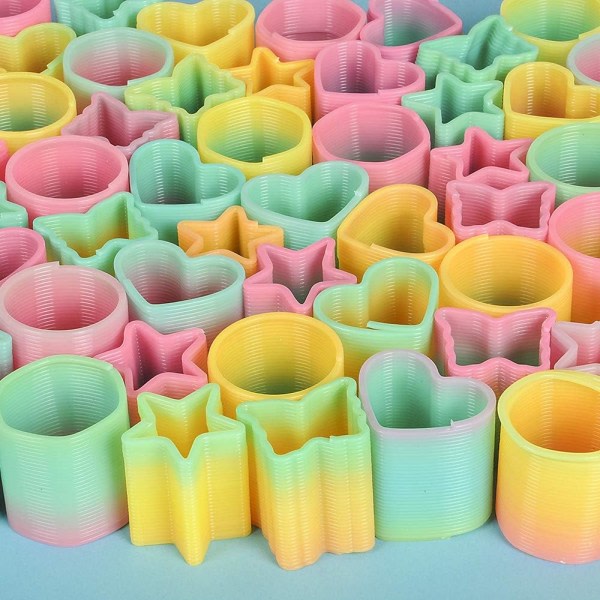 Mini plast spiralfjädrar leksaker | Bedwinas ljusa färger och Sh