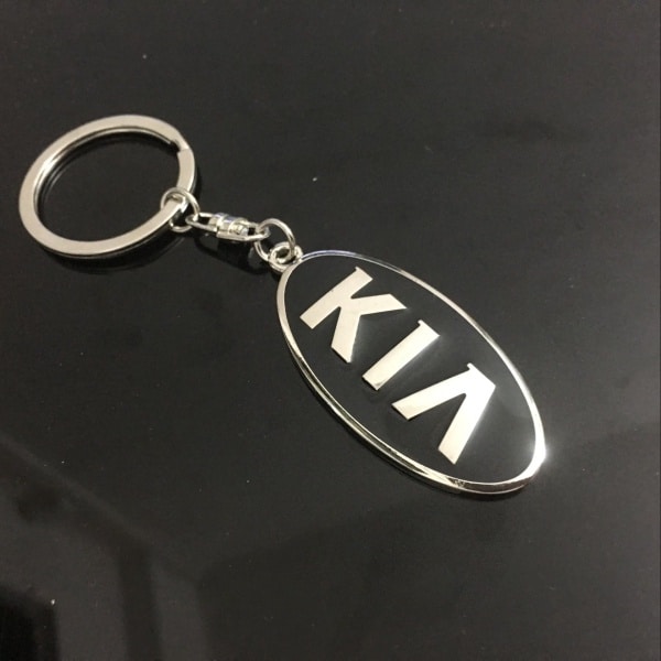 KIA-logolla varustettu metalli-epoksi avaimenperä