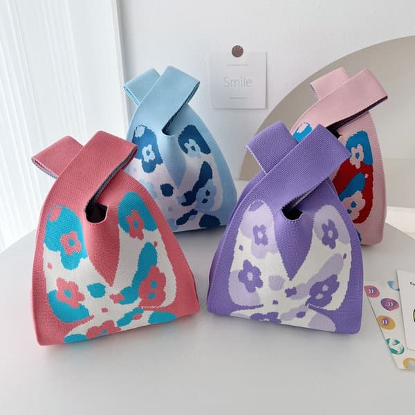 Stickad handledsväska med knut ROSA pink