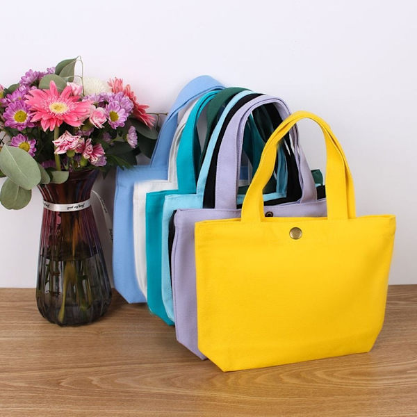 Minikäsilaukku Canvas Kangaskassi KELTAINEN M yellow M