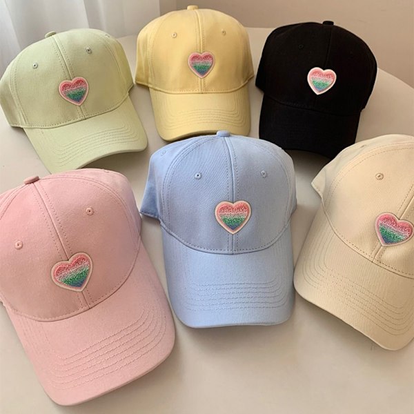 Love Heart -lippikset Peaked Cap MUSTA black
