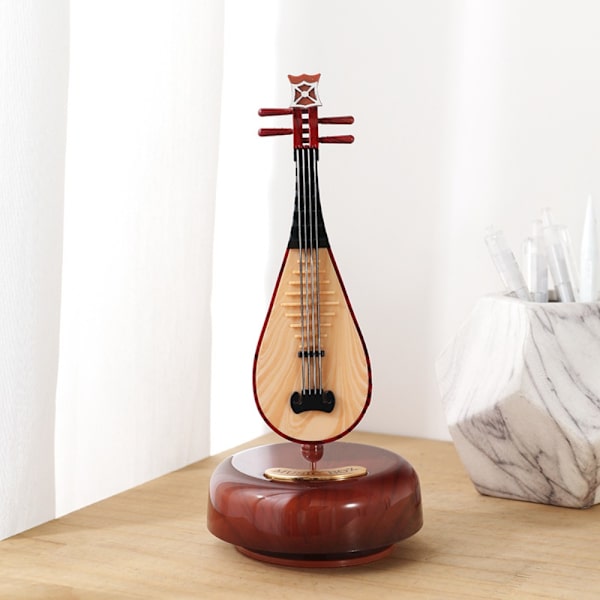 Roterende spilledåse Musikinstrumentmodel Spilledåse E E E