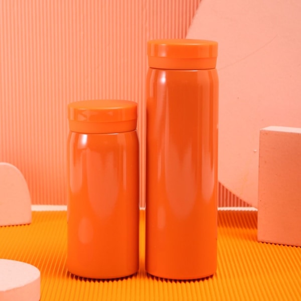 Ruostumattomasta teräksestä valmistettu vesipullo ohut eristetty thermal orange 280ml-280ml