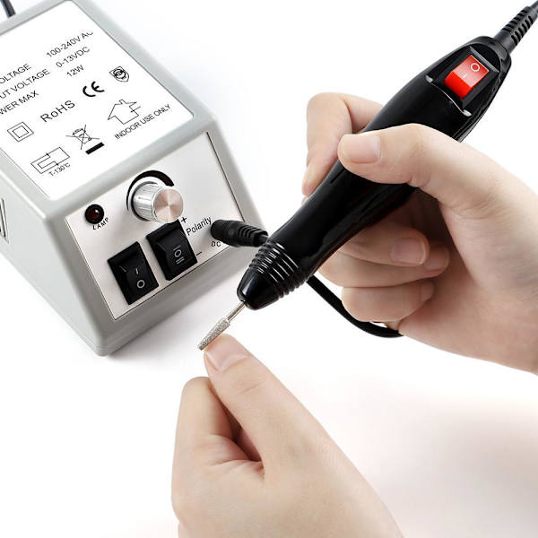 Elektrisk nagelfil med 12 tillbehör för slipning/polering Grå