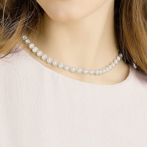 Änglaliknande halsband, örhängen och armband i kristallsmyckeskollektion, roséguld och guldtonad finish
