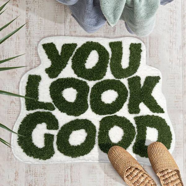 Badrumsmatta med texten \"You Look Good\" i rosa, 25\"x21\"