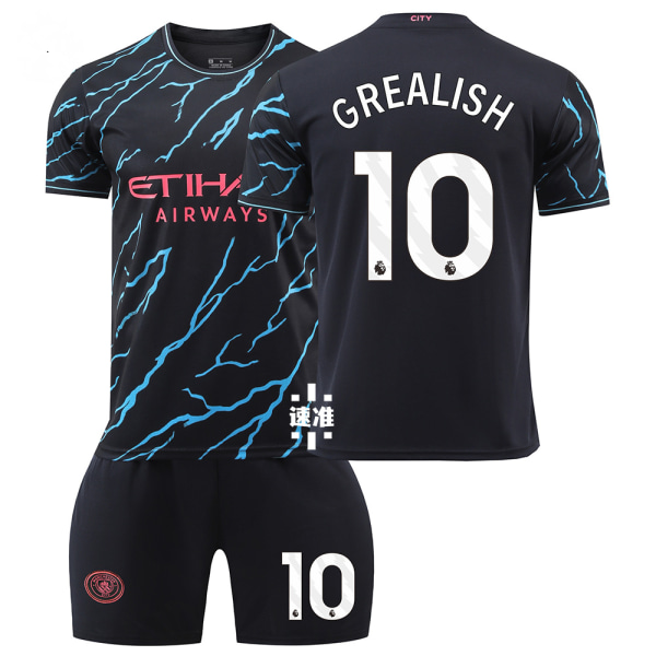 2324 Manchester City 2 udebanebørnefodboldsæt med sokker og beskyttelsesudstyr 10 GREALISH children' sizes 26
