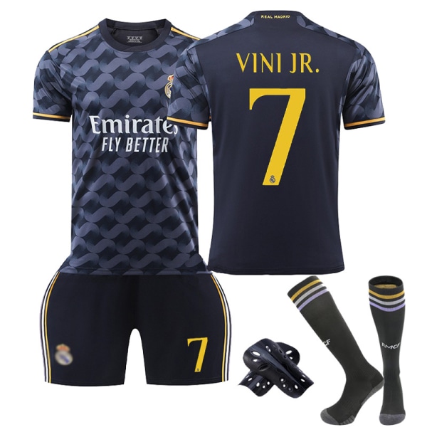 Real Madridin vieraskenttä lasten jalkapalloasu 23/24 kaudelle, jossa sukat ja suojavarusteet 7 VINI JR. Children's size18