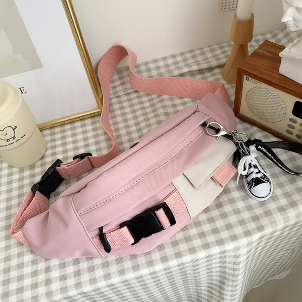 Pink Strap Daisy Shoe Pendant Väska kvinnors budbärare all-match ins mode koreanska versionen av den utländska luft bröstväska flicka midjeväska kvinnor