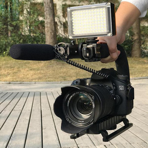 Handhållen C-formad fäste i plast med anti-shake-funktion för kamera och videokamera