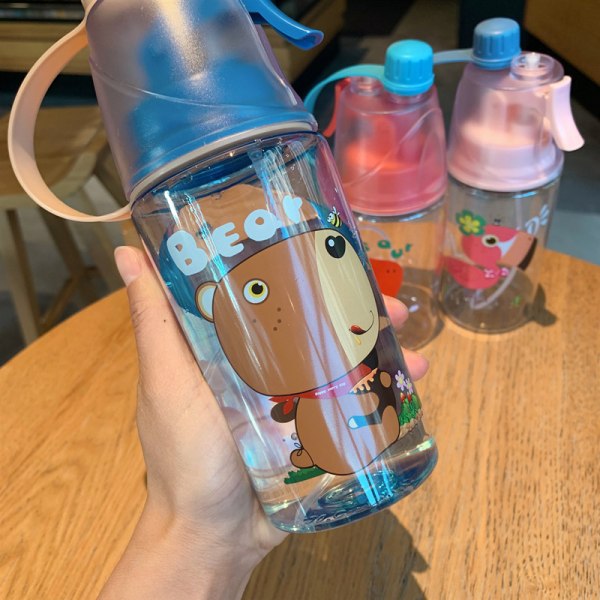 Uusi luova suihkupullo ulkokäyttöön kannettava urheiluvetopullo jäähdyttävä kesä lasten kannettava muovinen suihkupullo dinosaurus 400ml väriboksi