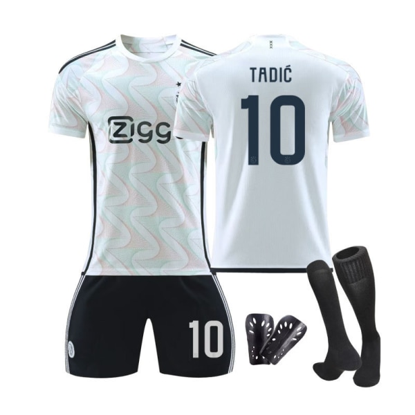 Ajaxin 23/24 kauden vieraspelipaita lapsille, sukat ja suojavarusteet 10 TADIC S