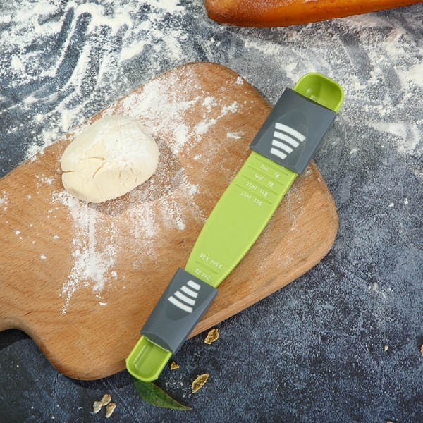 Justerbar måttsked, kreativ dubbeländad justerbar skala, åtta bås måttsked, mätning av torra/halvflytande ingredienser