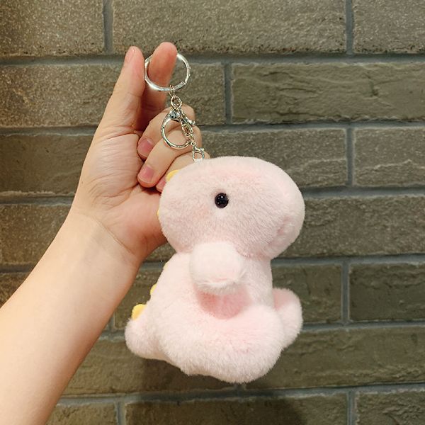 Söt liten docka, parväska hänge, plyschleksak docka nyckelring, docka hänge Plush Sitting Dinosaur - Pink