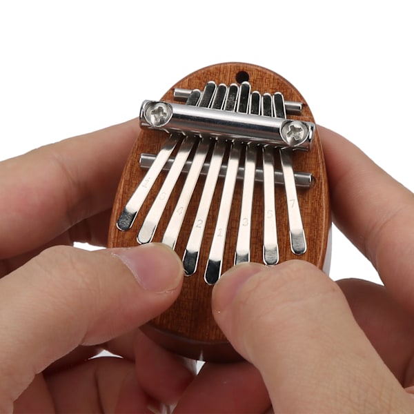 8-tangenters Kalimba tummepiano kit mini massivt trä hänge leksak födelsedagspresent musikinstrument