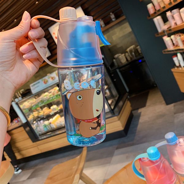 Uusi luova suihkupullo ulkokäyttöön kannettava urheiluvetopullo jäähdyttävä kesä lasten kannettava muovinen suihkupullo dinosaurus 400ml väriboksi