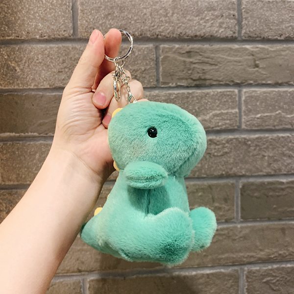 Söpö pieni nukke, parin laukku riipus, pehmolelu nukke avaimenperä, nukke riipus Plush Sitting Dinosaur - Dark Green