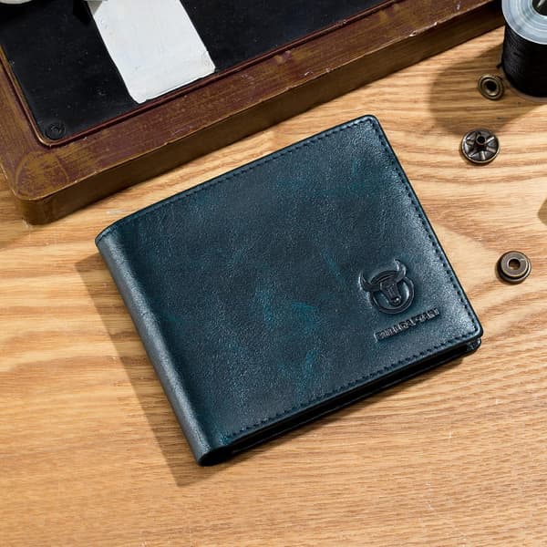 RFID-plånböcker för män Slim Bifold Äkta läder Framficka Plånbok med 2 ID-fönster QB-05 (Påfågelblå)