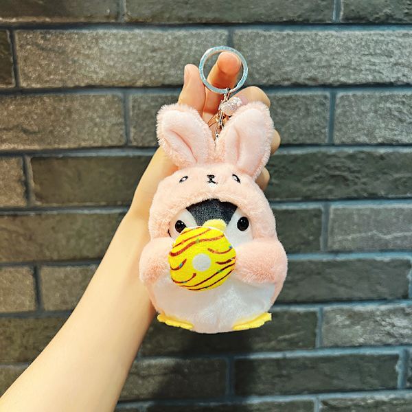 Söpö pieni nukke, pari laukku riipus, pehmolelu nukke avaimenperä, nukke riipus Donut costume penguin rabbit