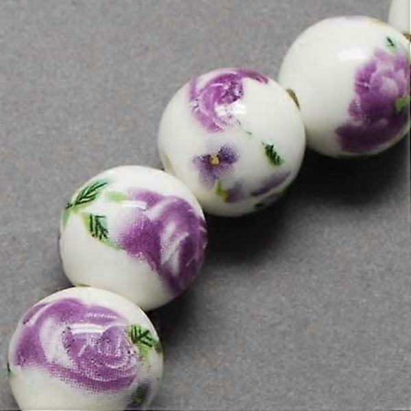 Omkring 20 stk. håndlavede porcelænsperler runde med blomsterformet charm, mellemblå farve, afstandsstykke, løse perler til gør-det-selv smykkefremstilling