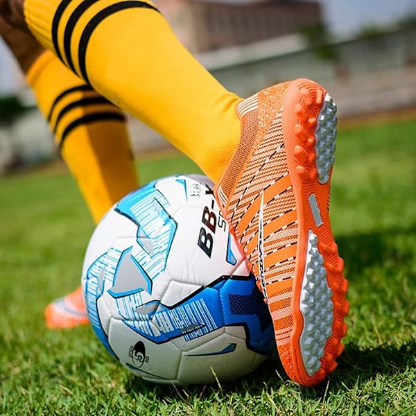 Unisex fotbollsskor för konstgräs | Utomhus/inomhus pojkar flickor professionell futsal fotbollsträning fast mark fotbollsskor orange EU39