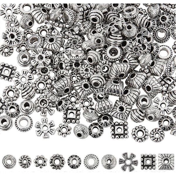 1 Ask 200 st 10 Stilar Silver Spacer Pärlor Platta Runda Spacer Pärlor Tibetansk Stil Legering Vintage Rondelle Blomma Metall Små Pärlor för Smyckestillverkning