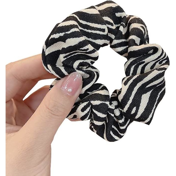 Leopardikuvioiset hiusdonitsit, eläinkuvioiset donitsit, 3 kpl poninhäntäpidikkeitä Black Zebra