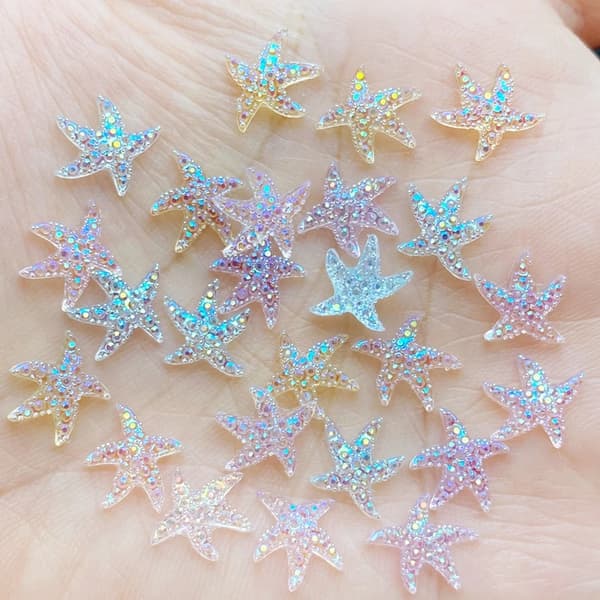 100 stk. Nye Søde Mini Søstjerner Resin Figur Håndværk Flatback Cabochon Ornament Smykkefremstilling Hårtilbehør~01699